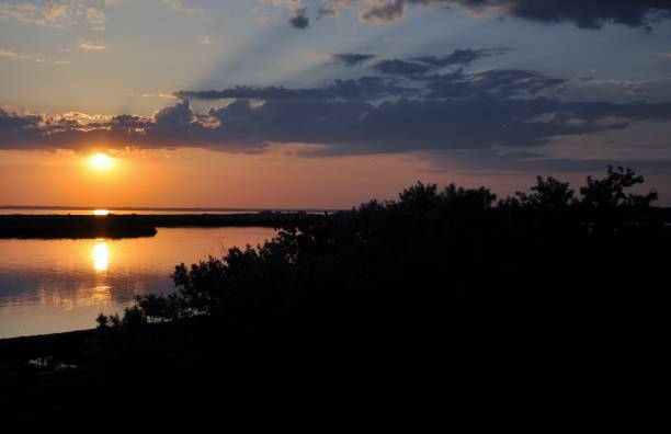 istock Sunset evening nature country summer water 970077850