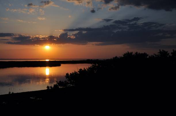 istock Sunset evening nature country summer water 970077884