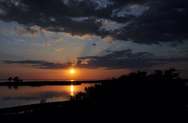 istock Sunset evening nature country summer water 970078064