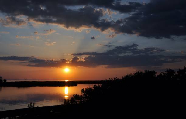 istock Sunset evening nature country summer water 970078100