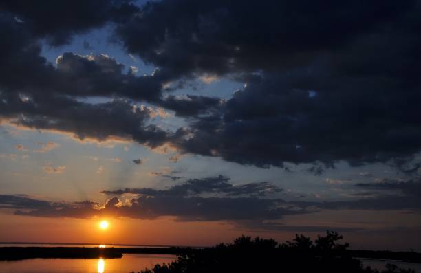 istock Sunset evening nature country summer water 970078280