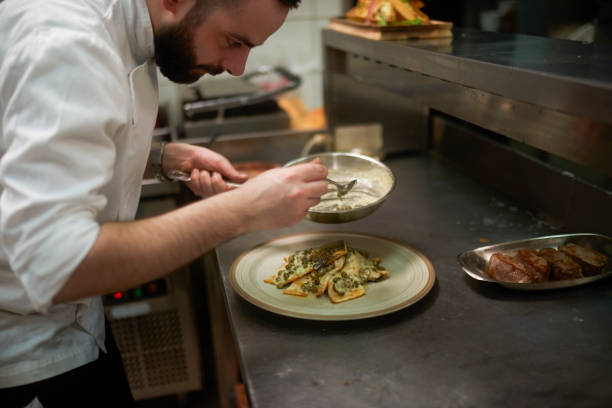 istock Chef preparing food 970081560