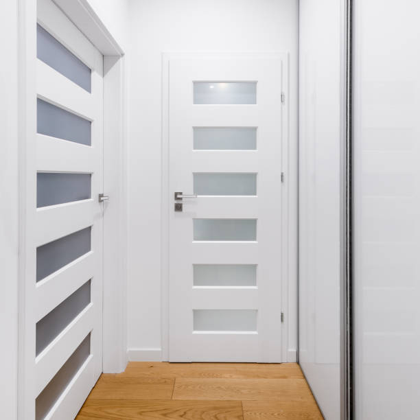 istock Hallway with white doors 970081628