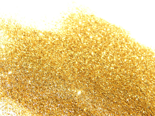 istock Textured background with golden glitter sparkle on white 970081800