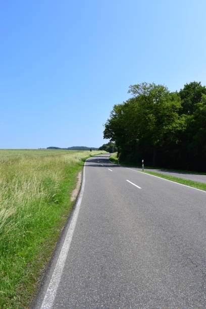 istock lonely backroad in Eifel region 970084646