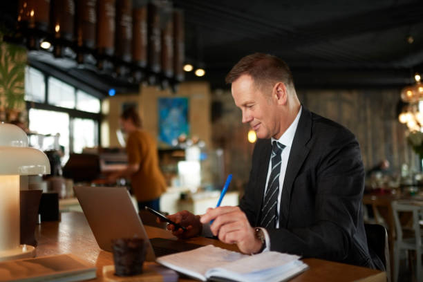 istock Businessman in coffee shop 970085058