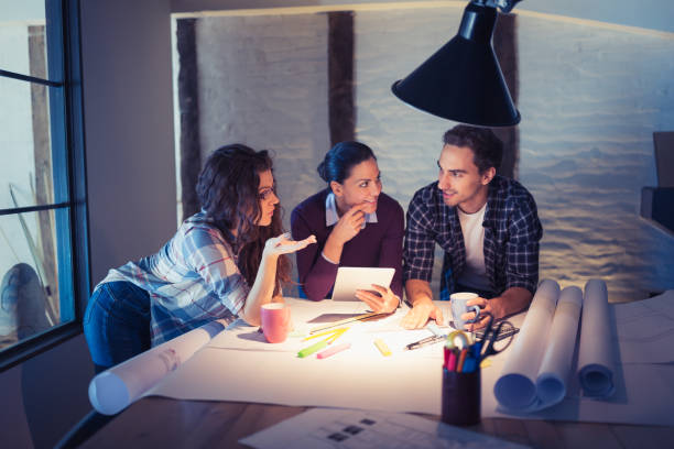 istock Female Leaders. Group of young architects working together in architecture studio 970086260