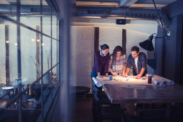 istock Female Leaders. Group of young architects working together in architecture studio 970086262