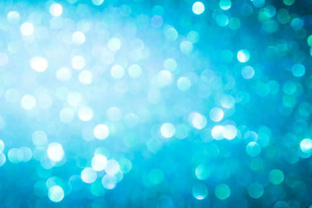 istock blue blur abstract background. bokeh christmas blurred beautiful shiny Christmas lights. 970090562