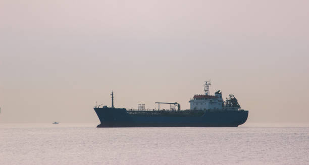 istock breakwater, and ships on the horizon. 970095694