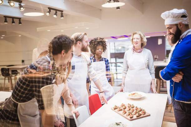 istock People in cooking class enjoying their time 970096042