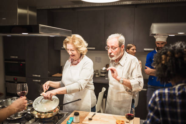 istock People in a cooking class enjoying their time 970096140
