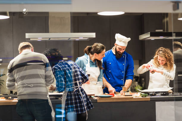 istock People in a cooking class enjoying their time 970096170