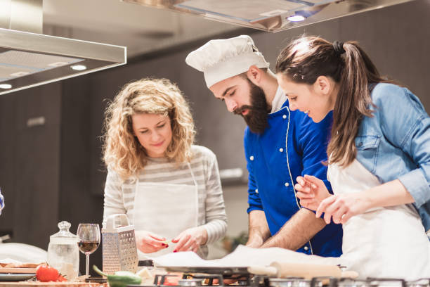 istock People in a cooking class enjoying their time 970096176