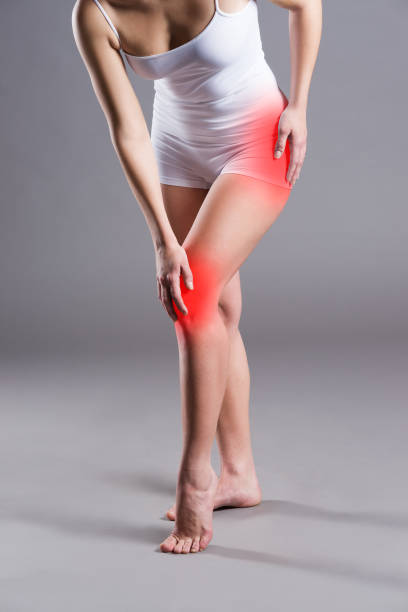 istock Pain in knee, joint inflammation, on gray background 970097114