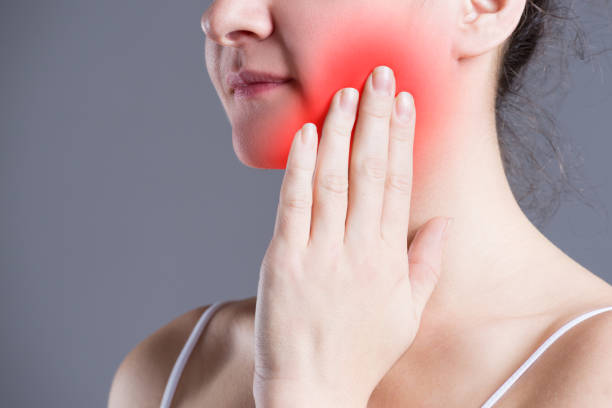 istock Woman with toothache, teeth pain closeup 970097312