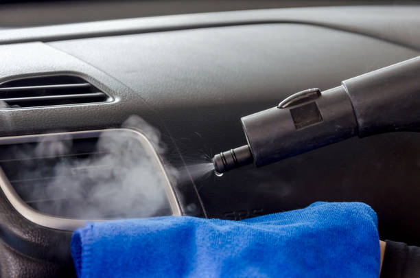 Cleaning of car air conditioner stock photo