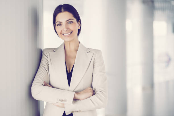 istock Smiling Beautiful Business Lady Relaxing in Hall 970105956