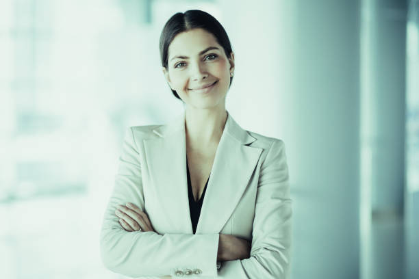 istock Smiling Attractive Business Lady in Office Hall 970106008