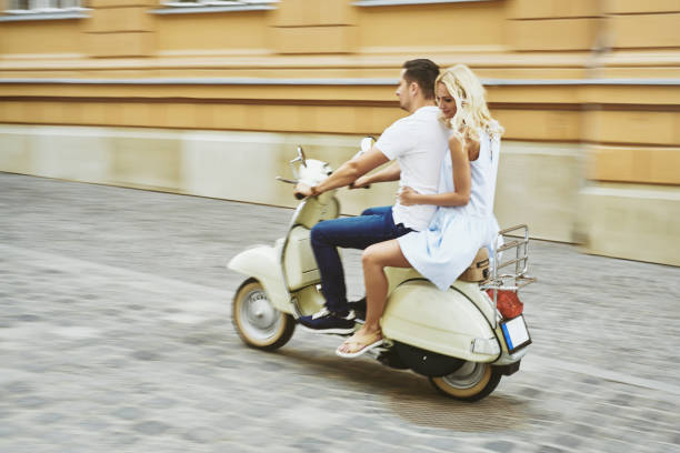 istock Young Couple on a Scooter 970108566