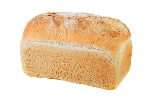 Close-up of crusty white farmhouse bread isolated on a white background