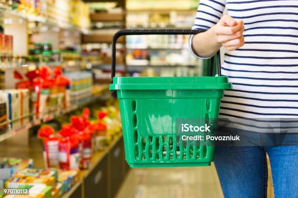 Beautiful Young Woman Groceries Shopping In Local Supermarket Stock Photo - Download Image Now