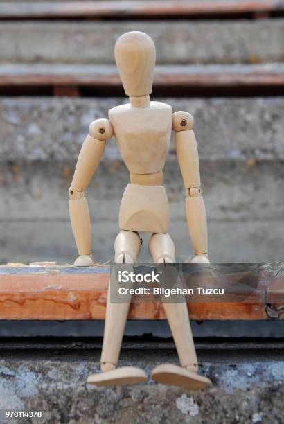 Wooden Puppet In Cityscape Stock Photo - Download Image Now - Architecture, Beauty, City