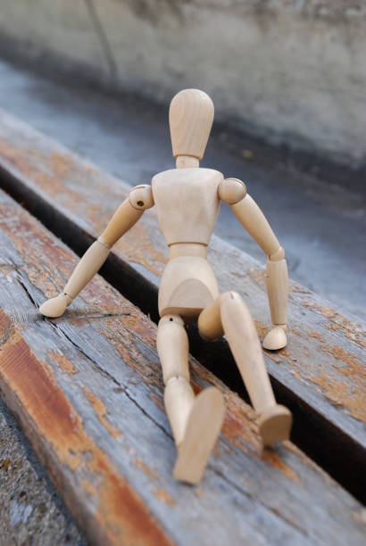 istock Wooden puppet in cityscape 970114388
