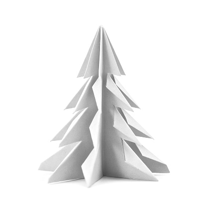 Origami Christmas tree with paper isolated on white background for decoration, front view.