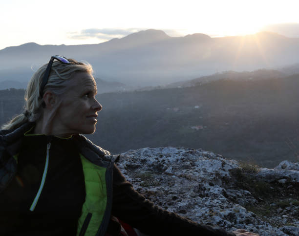 istock Female hiker relaxes on mountain 970117462