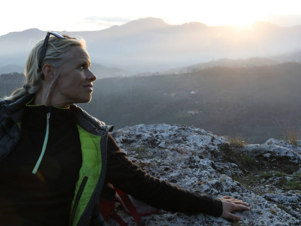 istock Female hiker relaxes on mountain 970117478