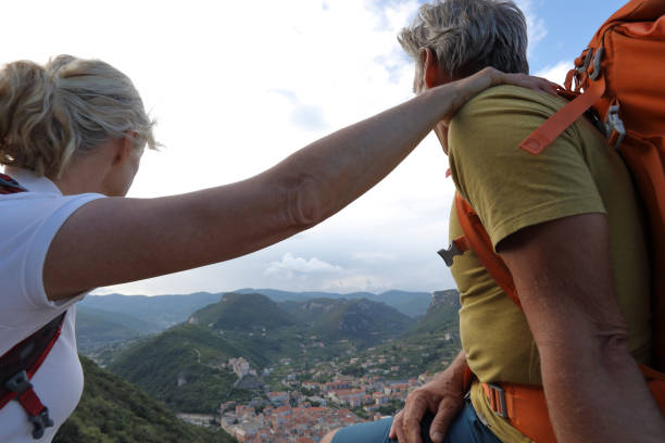 istock Couple relax after hiking 970121784