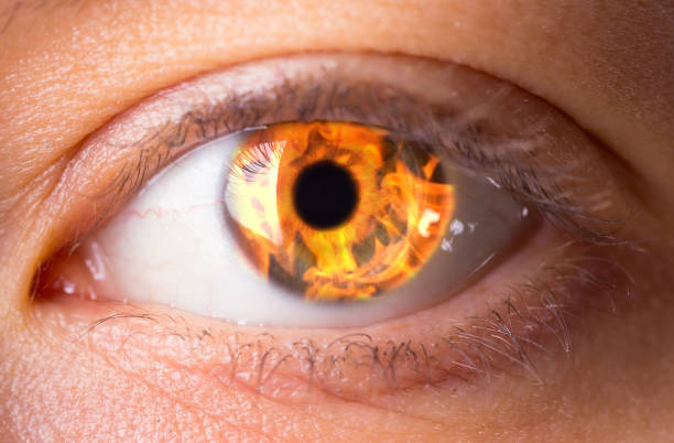 istock woman eye with burning fire in it 970123442