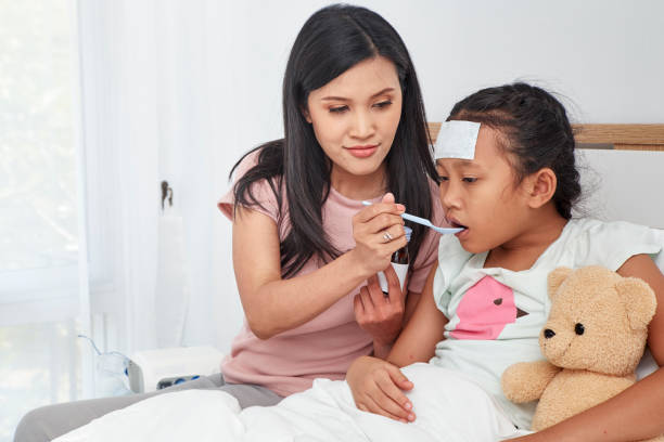 istock Troubled caring mother curing her daughter 970123634