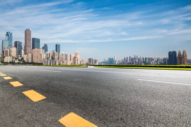 istock Panoramic skyline and modern business office buildings with empty road,empty concrete square floor 970126956
