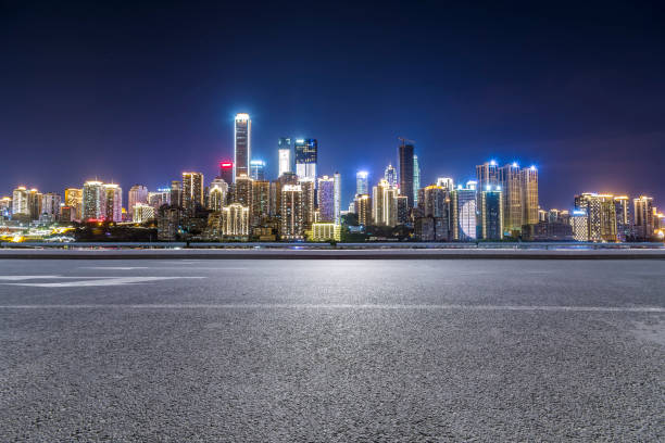 istock Panoramic skyline and modern business office buildings with empty road,empty concrete square floor 970128814