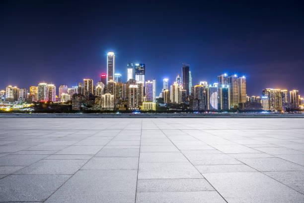 istock Panoramic skyline and modern business office buildings with empty road,empty concrete square floor 970129072