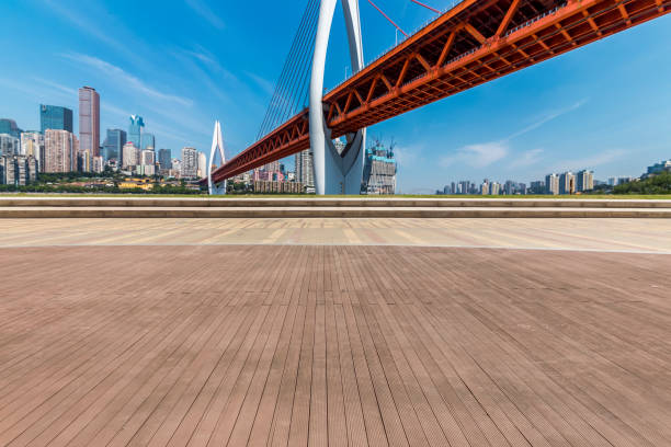 istock Panoramic skyline and modern business office buildings with empty road,empty concrete square floor 970129264