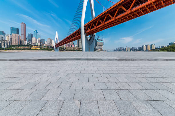 istock Panoramic skyline and modern business office buildings with empty road,empty concrete square floor 970131262