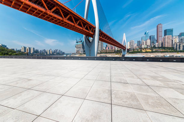 istock Panoramic skyline and modern business office buildings with empty road,empty concrete square floor 970131820