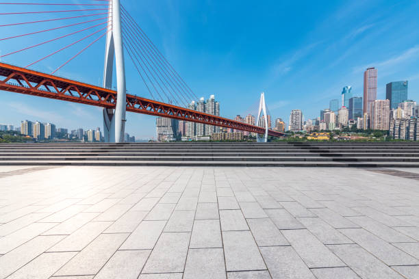 istock Panoramic skyline and modern business office buildings with empty road,empty concrete square floor 970132252