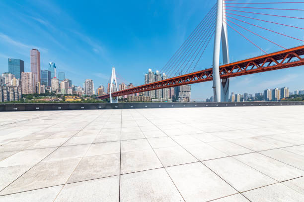 istock Panoramic skyline and modern business office buildings with empty road,empty concrete square floor 970132400