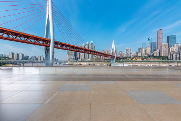 istock Panoramic skyline and modern business office buildings with empty road,empty concrete square floor 970132826