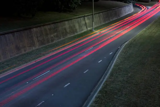 Long exposure of cars on a road at night