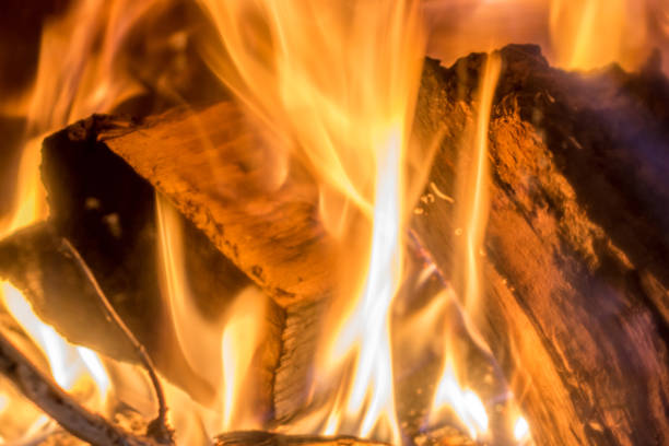 istock Close-up of a burning log in landscape format 970142848