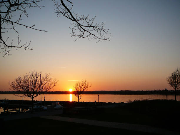 istock Sun setting over water in Danish village 970166484