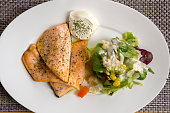 dish with salmon and salad in Norway