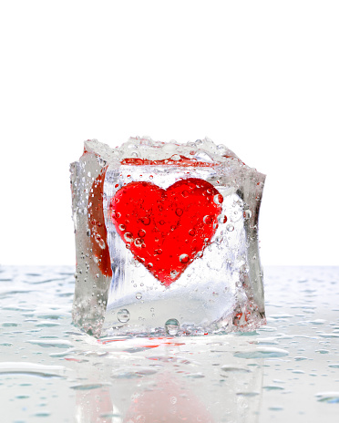 Red water splash forming a heart shape isolated on white background