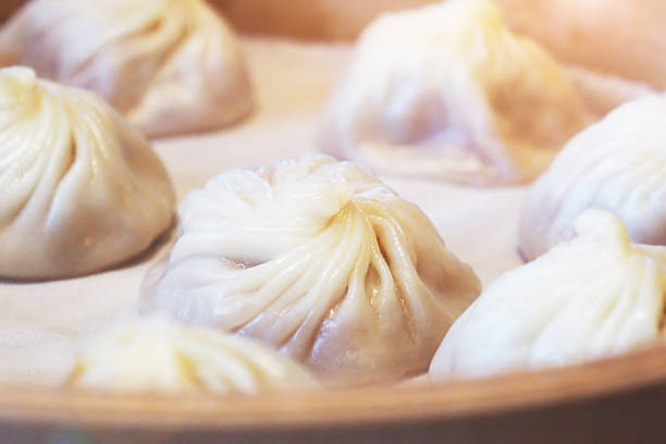 istock close up Xiao Long Bao steamed and served on bamboo basket 970217580