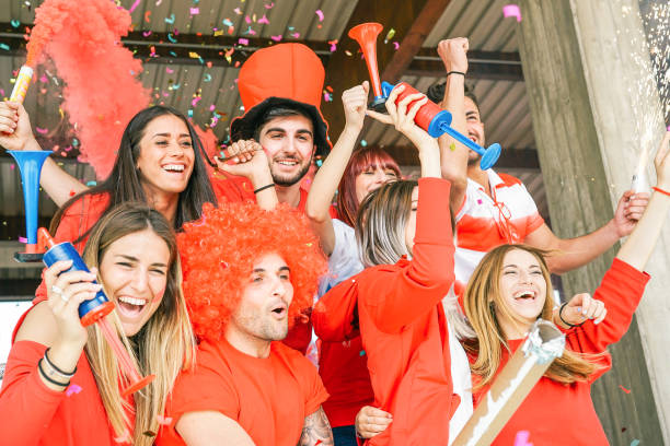 football supporter fans watching soccer world match at stadium - young group of excited friends having fun supporting the winner club - youth, sport and celebration score concept - soccer celebration success group of people imagens e fotografias de stock